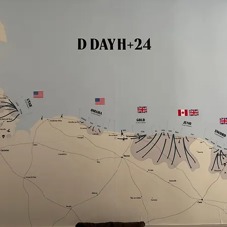 Casa vacanze Embruns Maison Spacieuse Rénovée 5 Ch 3 Sdb Belle Terrasse Aménagée Barbecue à 250 M De La En Plein Centre D' Au Coeur Des Plages Du Débarquement, Proximité De Bayeux Arromanches-les-Bains